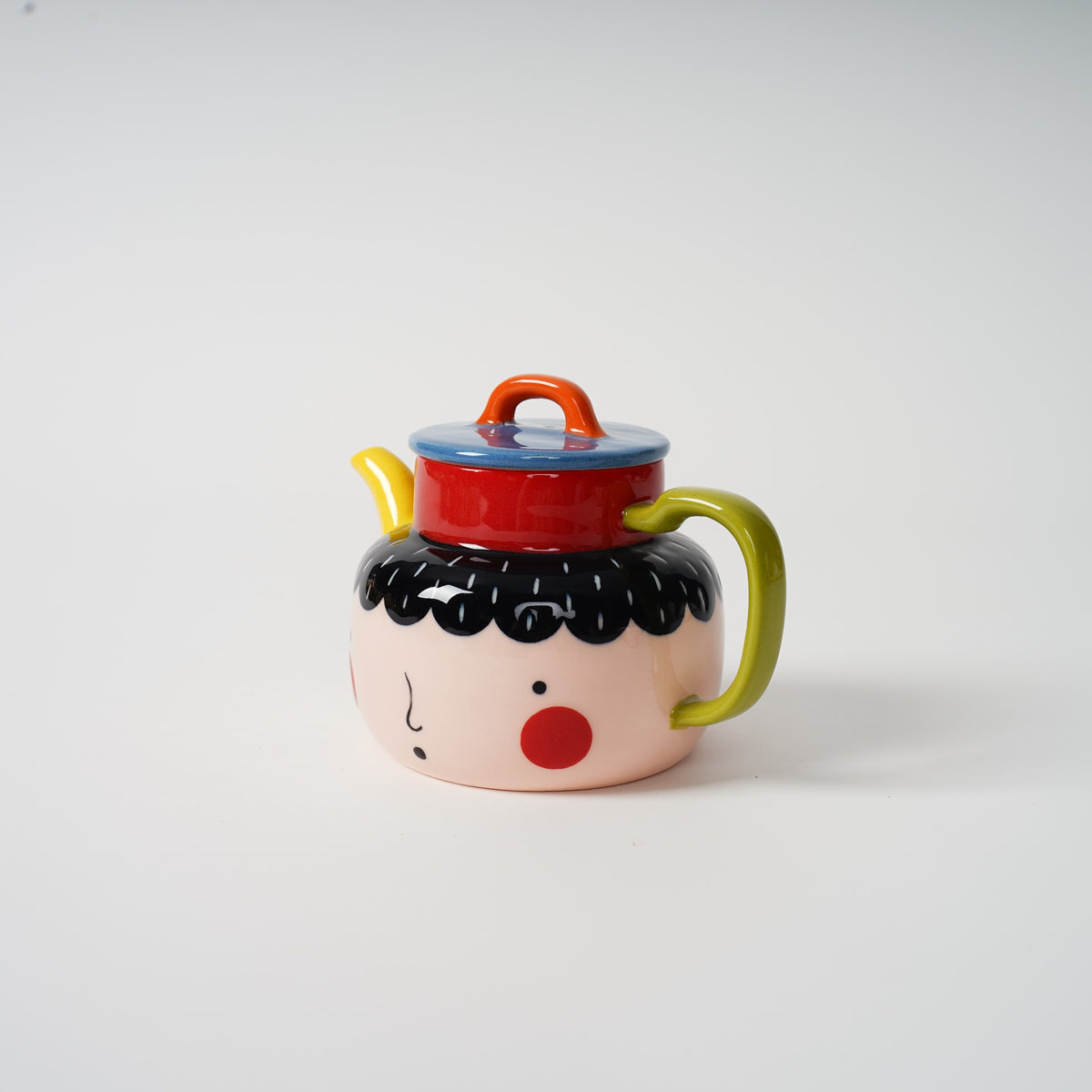 Two-Faced Ceramic Teapot side view