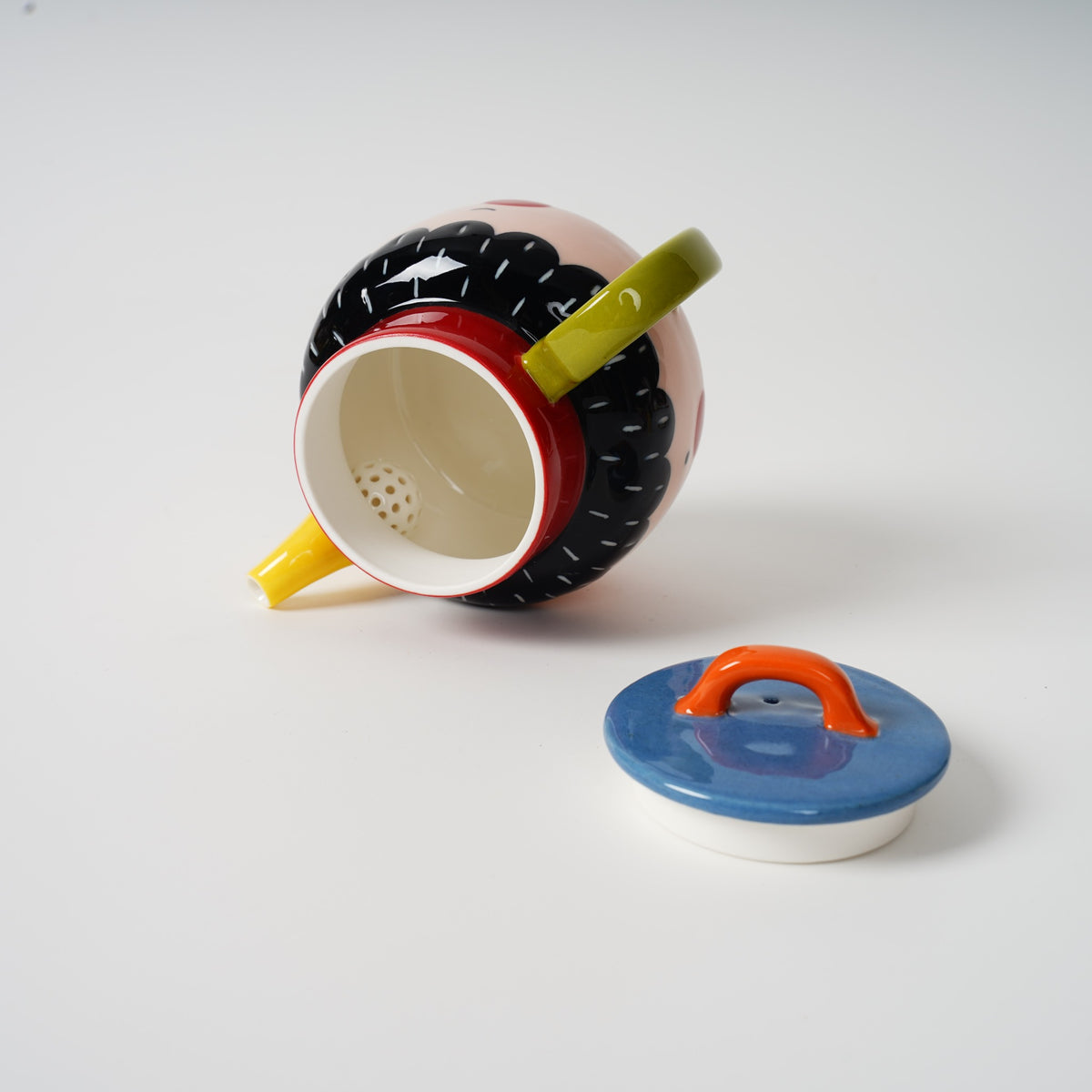 Two-Faced Ceramic Teapot group view