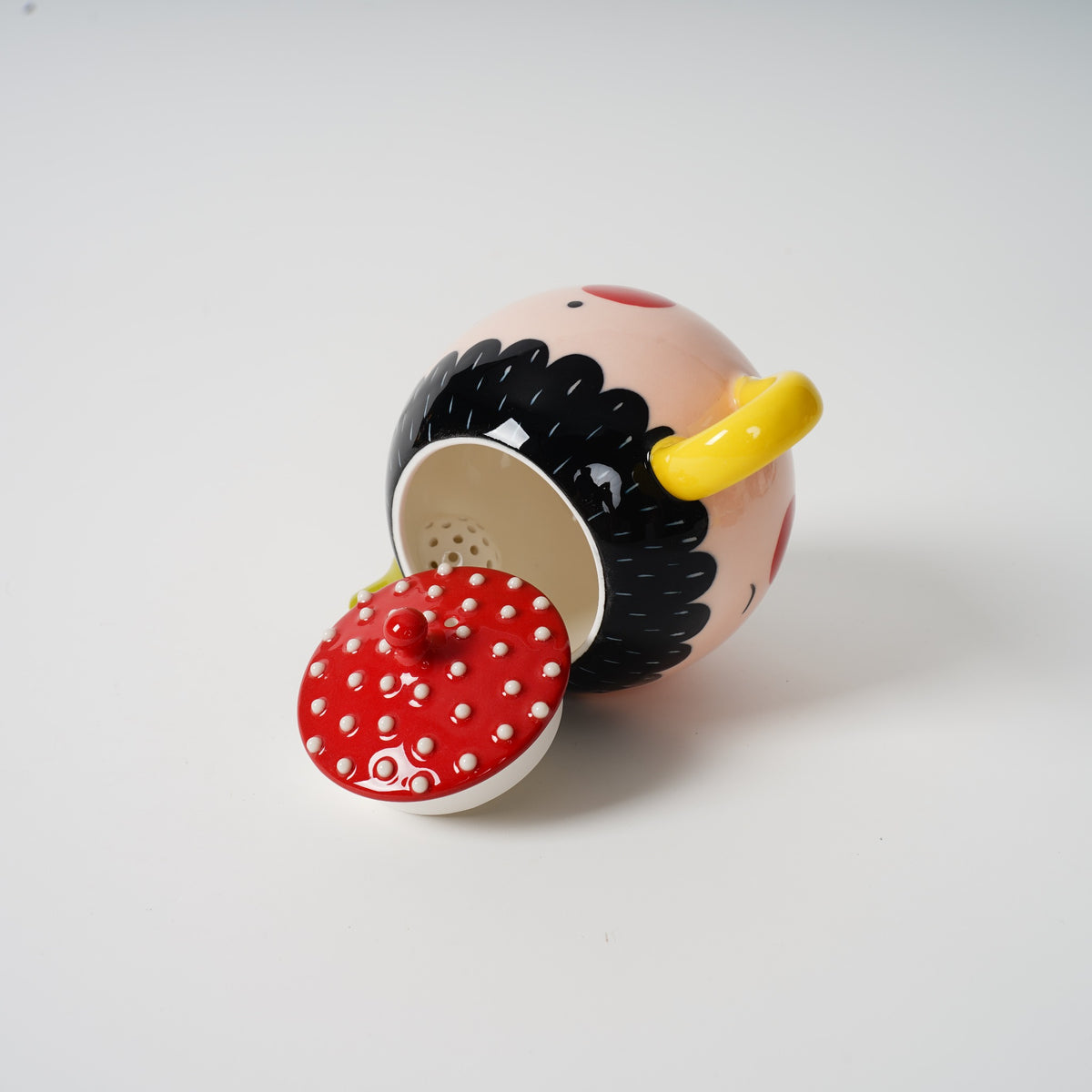Two-Faced Ceramic Teapot interior detail