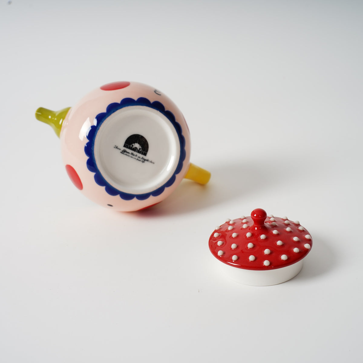 Two-Faced Ceramic Teapot alternate face side view