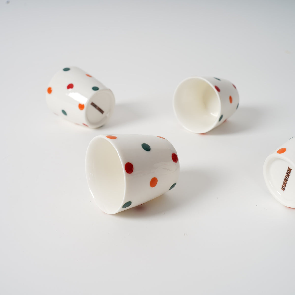 Hand-painted ceramic teapot side angle