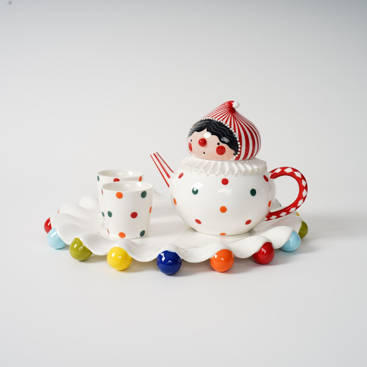 Handmade polka dot ceramic tea set detail