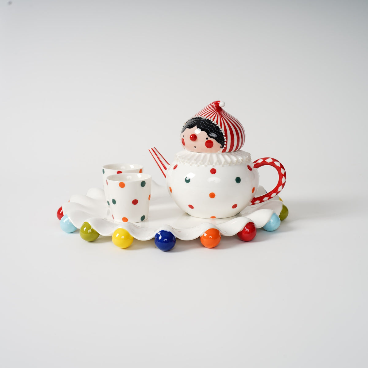 Handmade polka dot ceramic tea set detail