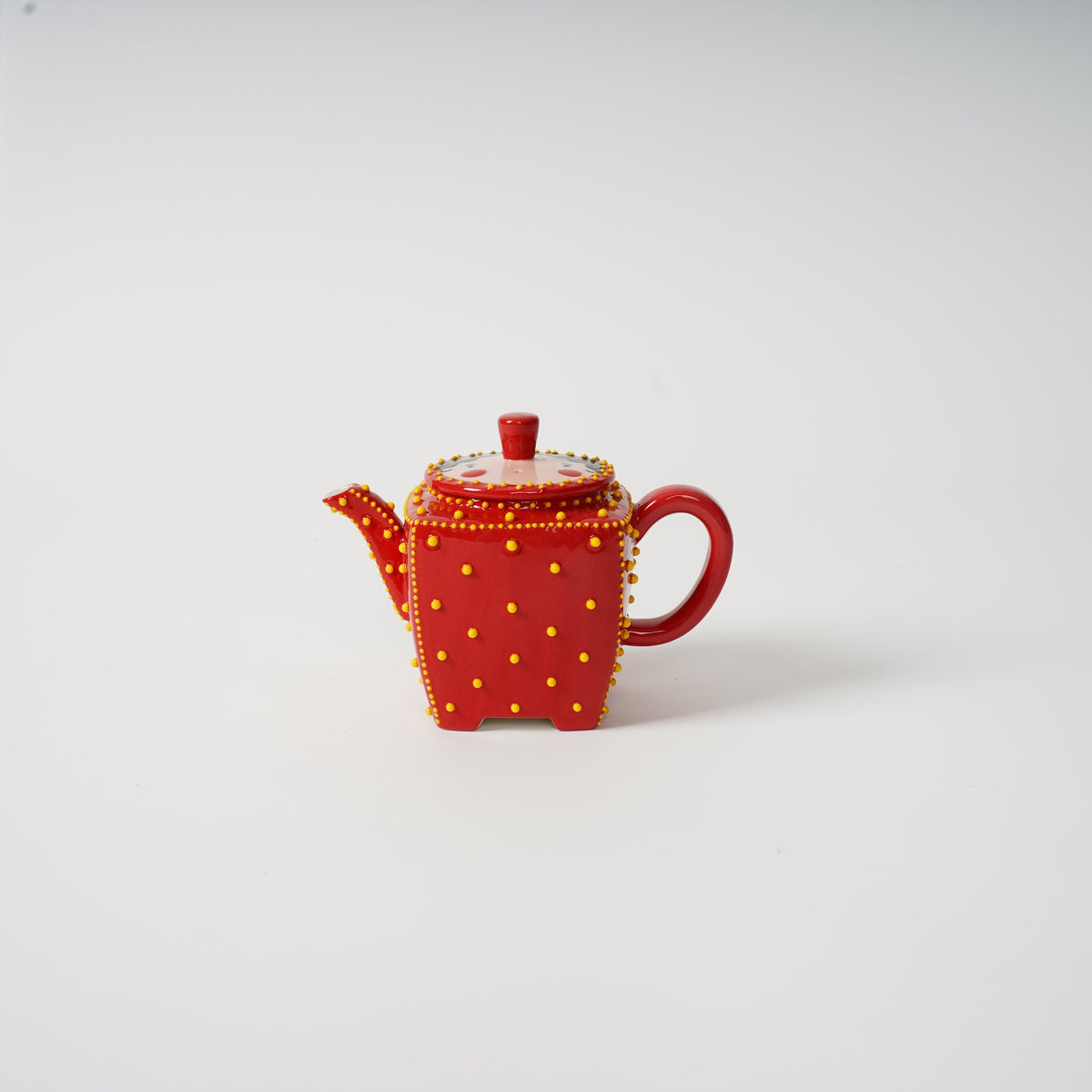 Handmade red square ceramic teapot detail