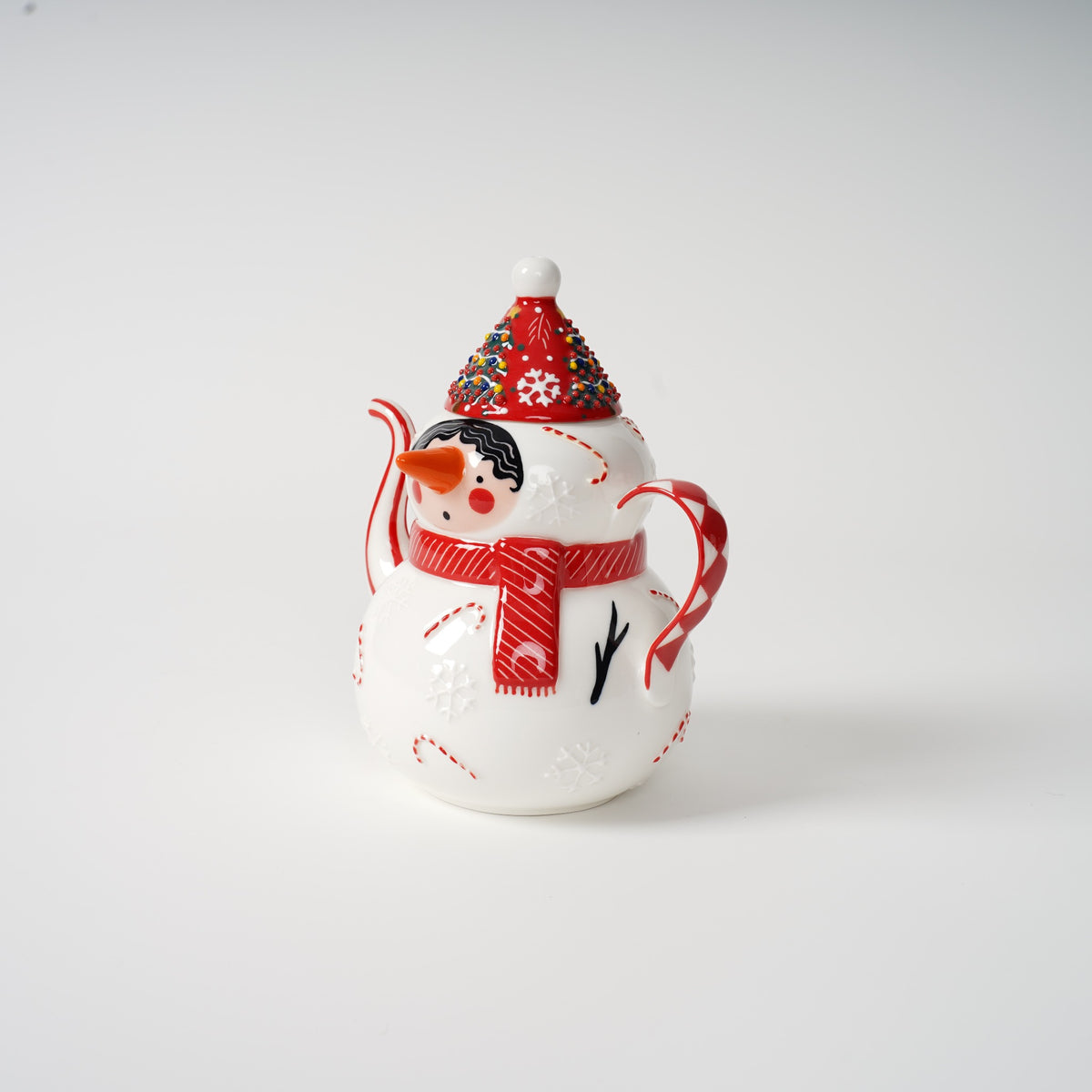 Hand-painted snowman ceramic tea set detail
