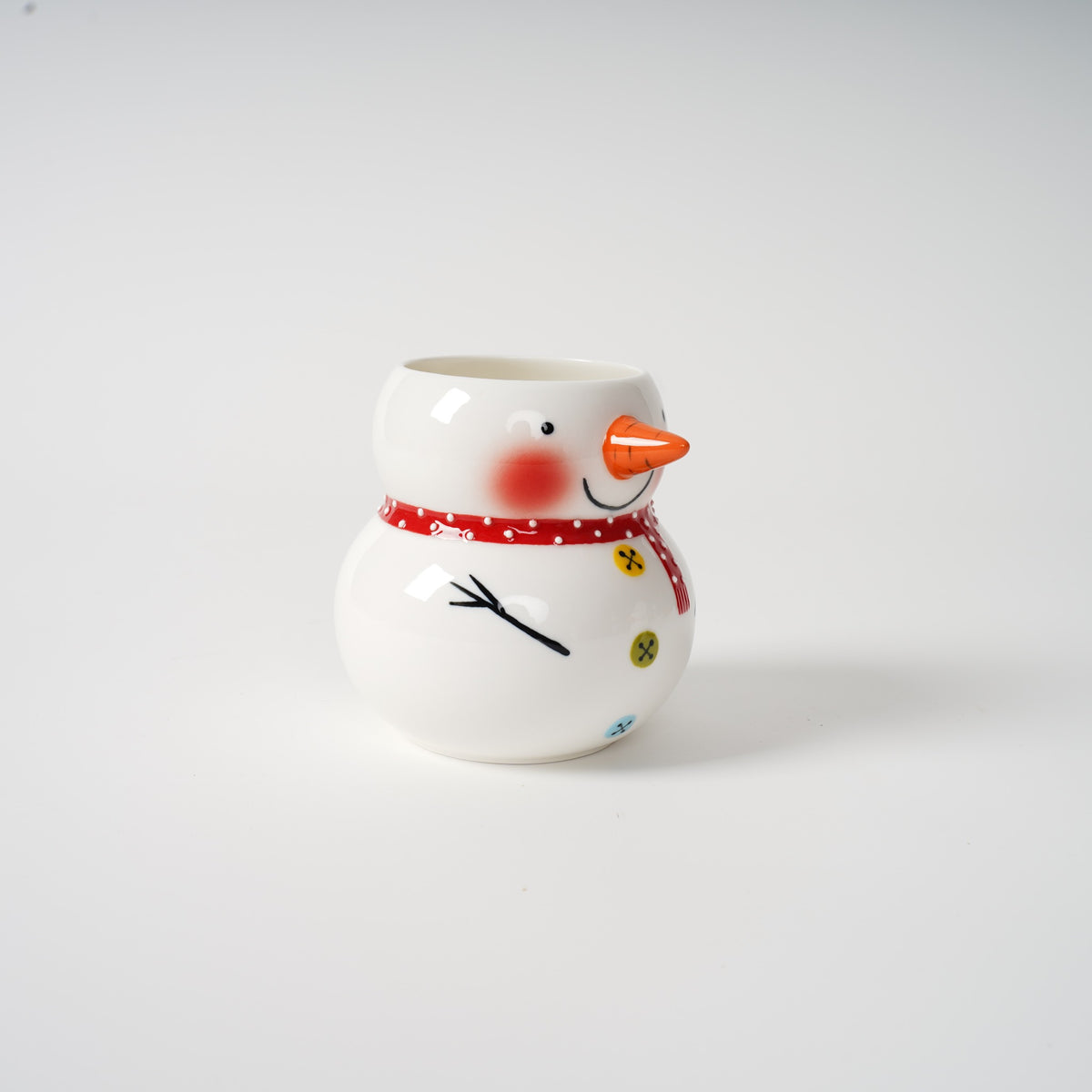 Hand-painted snowman ceramic tea set detail
