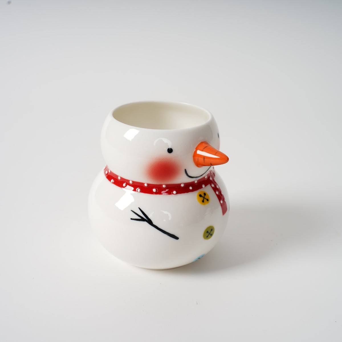 Hand-painted snowman ceramic tea set detail