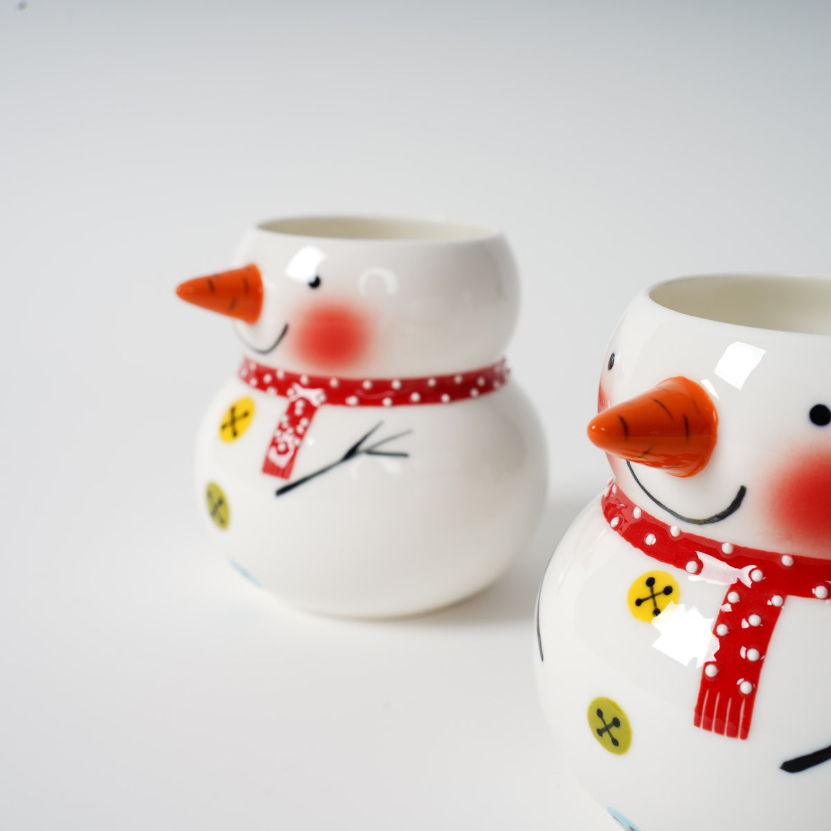 Hand-painted snowman ceramic tea set detail