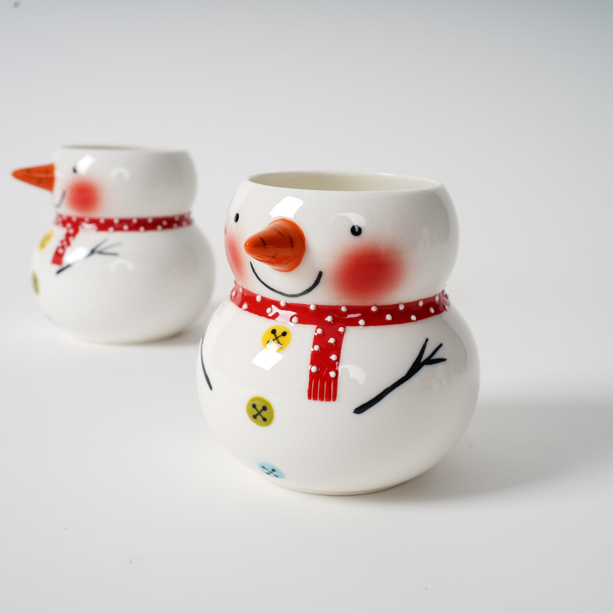 Hand-painted snowman ceramic tea set detail