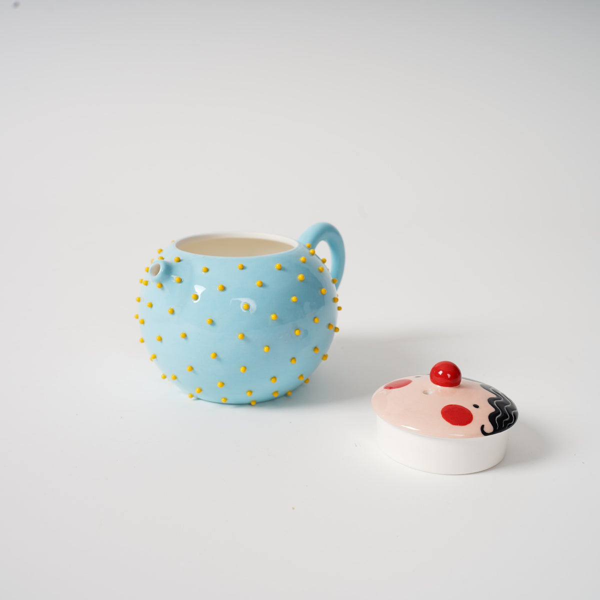 Spiky Face Ceramic Teapot interior and removable face lid