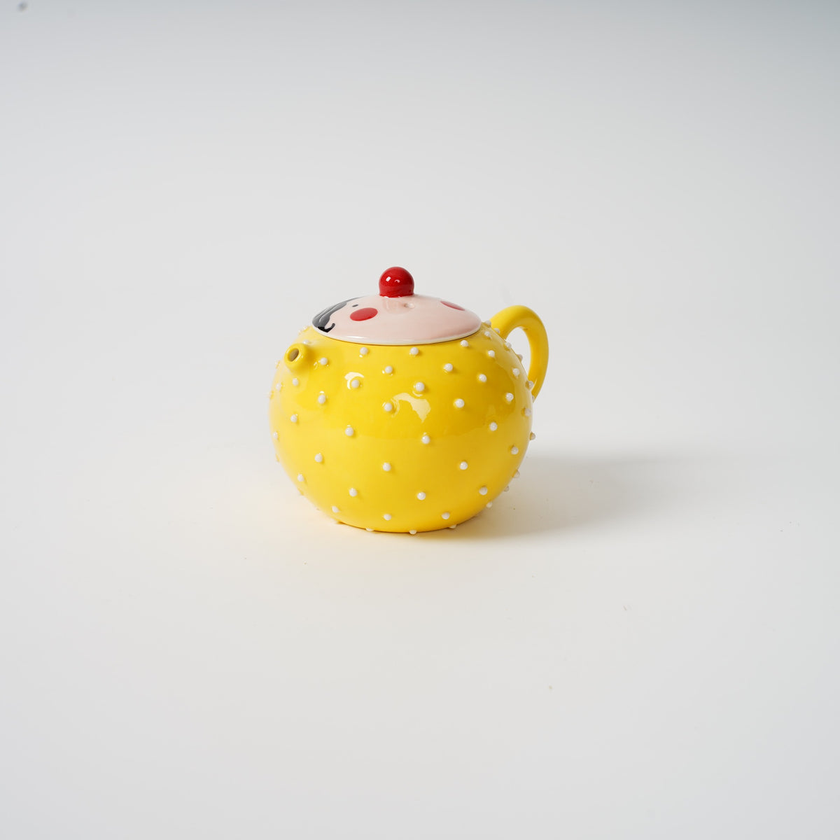 Spiky Face Ceramic Teapot in lemon yellow