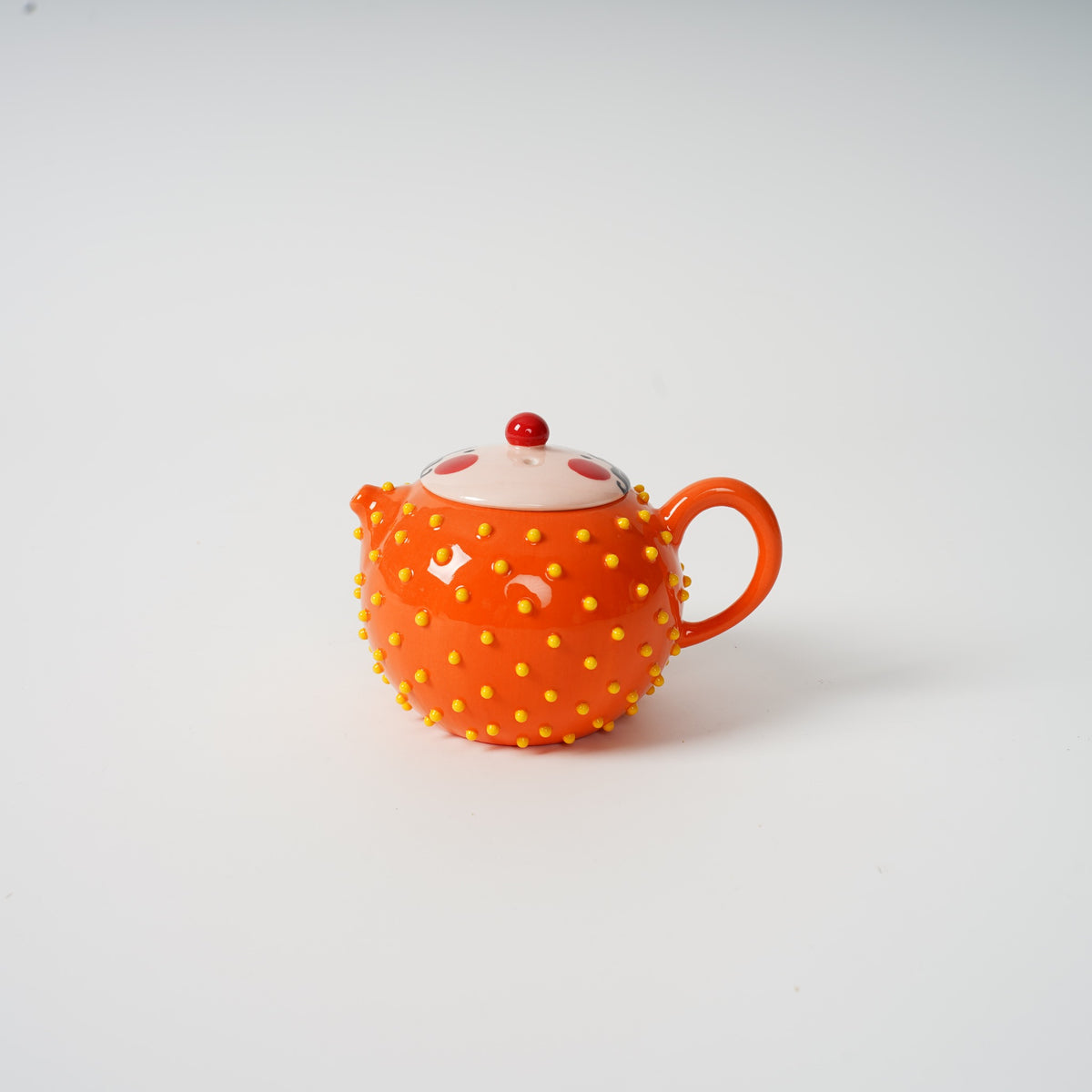 Spiky Face Ceramic Teapot in orange